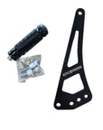 Black shift lock bracket with 'epic e rides' branding, a black foot lock, and a clear plastic bag with screws on a brown surface.