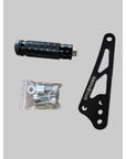 Black shift lock bracket with 'epic e rides' branding, a black foot lock, and a clear plastic bag with screws on a brown surface.
