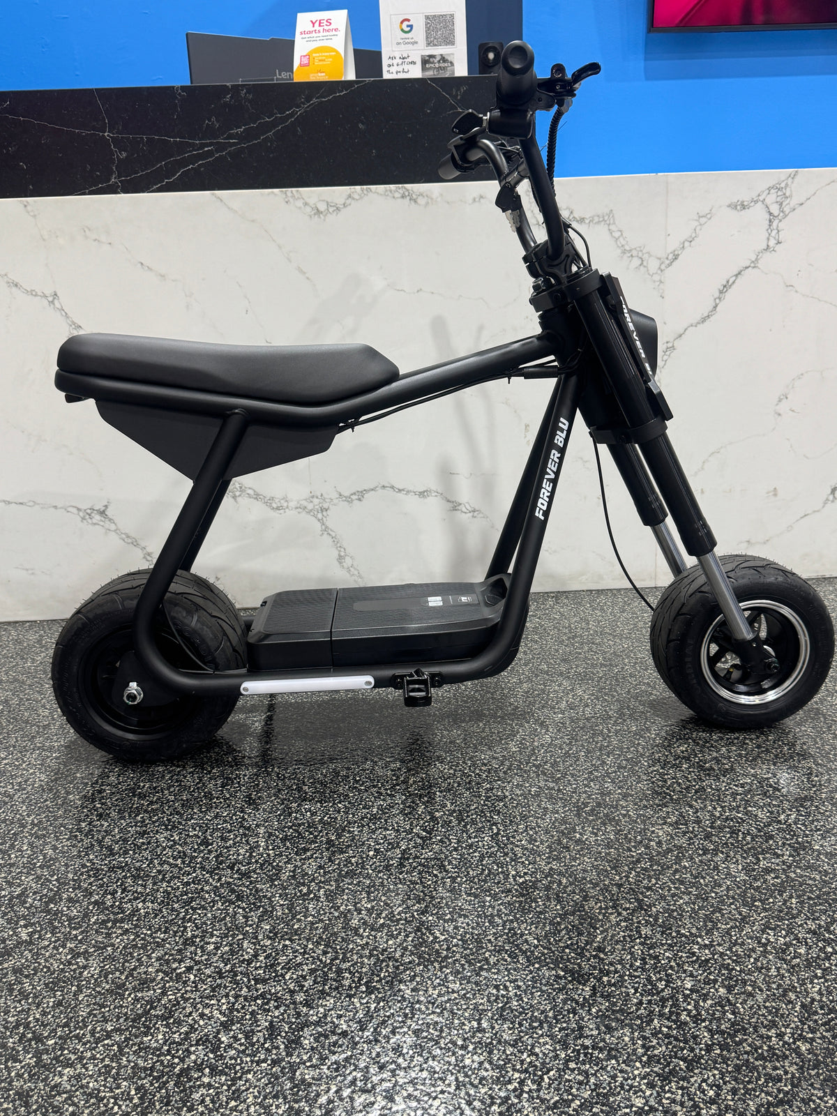Forever Blu Ryze auto wheelie bike